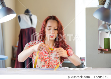 Seamstress woman at work Seamstress woman at work 47205149