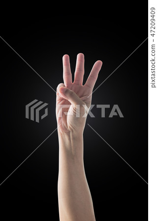 Hand up 3 three fingers with rim light isolated  47209409