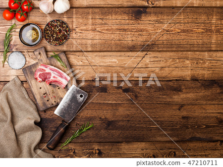 Fresh raw butchers lamb beef cutlets on  board 47210711