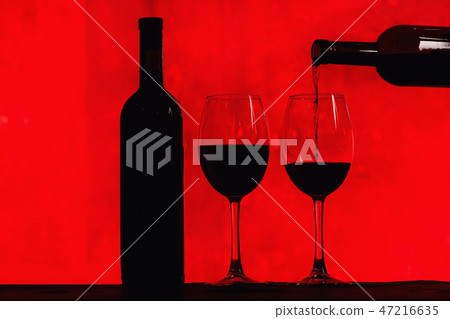 bottle of wine and glass with red wine bottle of wine and glass with red wine 47216635