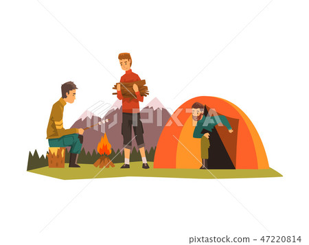 People camping, tourists sitting near bonfire, roasting marshmallows, outdoor adventures travel 47220814
