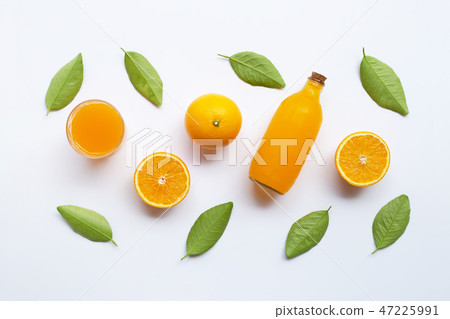 Oranges with orange juice and green leaves Oranges with orange juice and green leaves 47225991