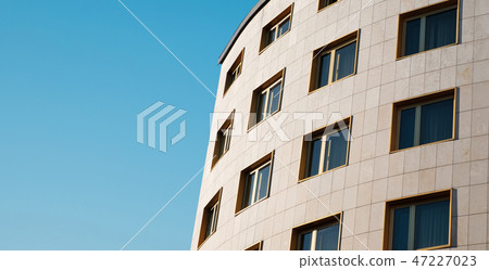 windows on building facade - real estate concept - 47227023