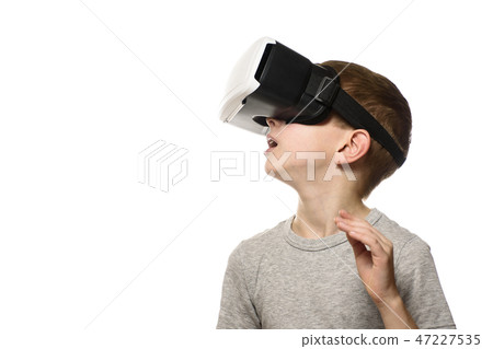 Boy experiencing virtual reality. Portrait Isolate Boy experiencing virtual reality. Portrait Isolate 47227535