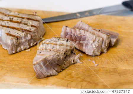 Chargrilled, seasoned tuna steaks 47227547