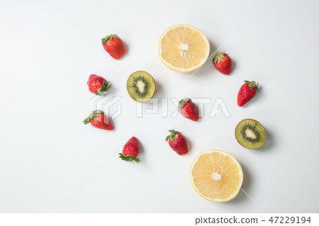 Freshly colored fruit with white background Freshly colored fruit with white background 47229194