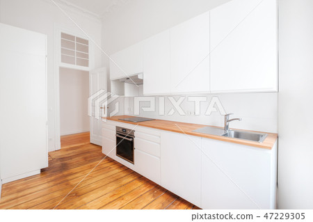 empty, new built-in kitchen with white furniture empty, new built-in kitchen with white furniture 47229305