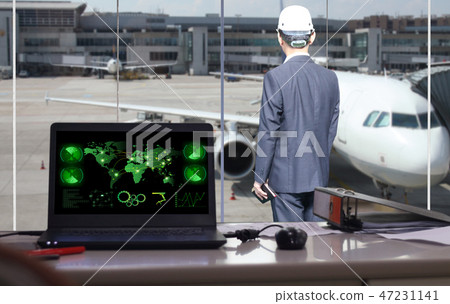 businessman is  looking airplane 47231141
