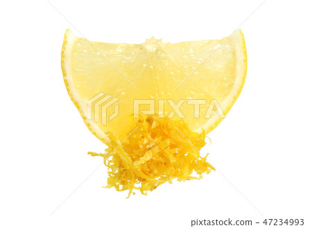 Fresh Lemon Zest with piece of fruit. Isolated Fresh Lemon Zest with piece of fruit. Isolated 47234993