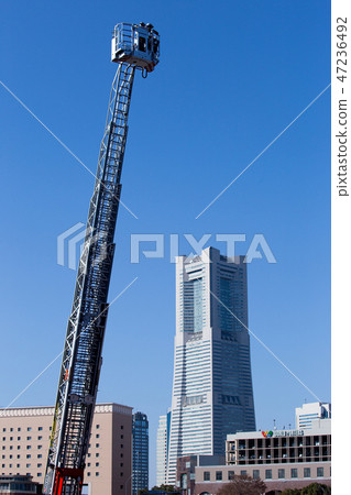 Ladder car and high rise building 47236492