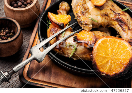 Roast chicken with orange Roast chicken with orange 47236827
