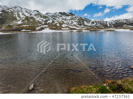 Spring Alps mountain lake Spring Alps mountain lake 47237561