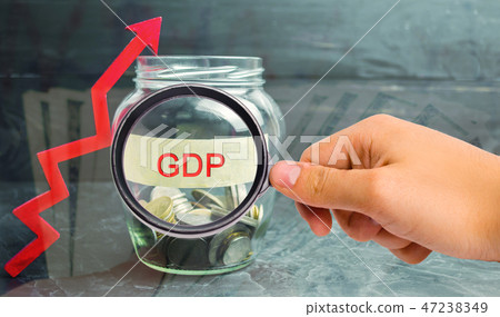 Glass jar with coins and the inscription  GDP  47238349