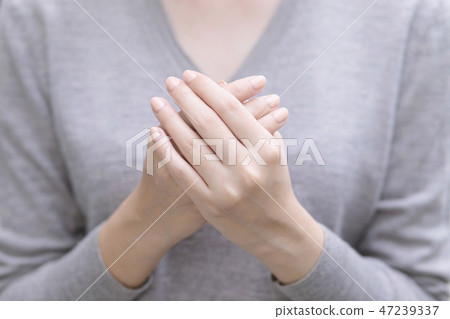 Close up of hands of woman showing Close up of hands of woman showing 47239337