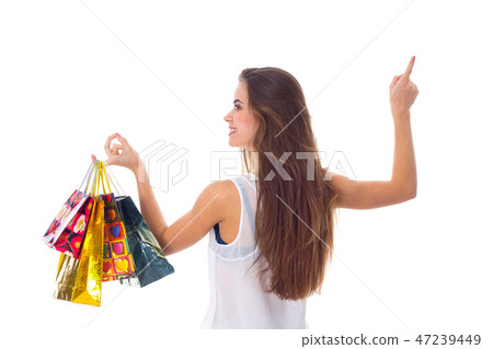 Woman with shopping bags 47239449