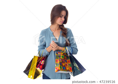 Woman with shopping bags 47239516