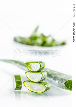 Slices of aloe vera with gel on white background 47240331