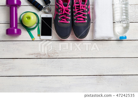Fitness healthy concept,sneakers,apple,water Fitness healthy concept,sneakers,apple,water 47242535