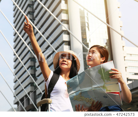 Beautiful two women traveling in Summer heat. 47242573