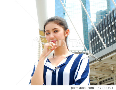 Beautiful women smile portrait and sunlight Beautiful women smile portrait and sunlight 47242593