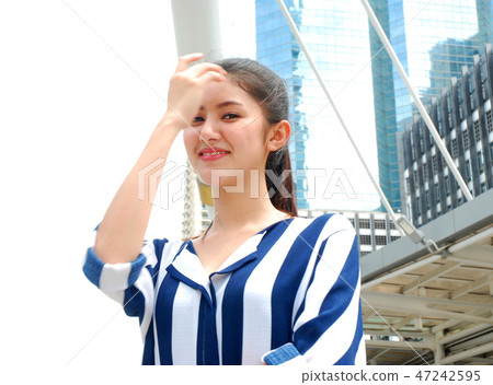 Beautiful women smile portrait and sunlight Beautiful women smile portrait and sunlight 47242595