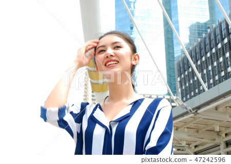 Beautiful women smile portrait and sunlight Beautiful women smile portrait and sunlight 47242596