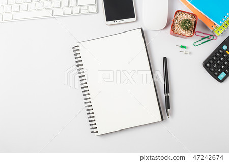 Top view, empty notebook and office supplies 47242674