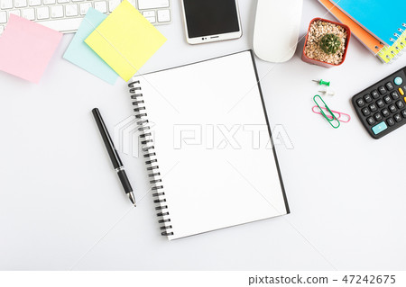 Top view, empty notebook and office supplies 47242675