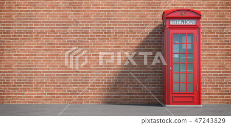 Red phone booth on brick wall background. London Red phone booth on brick wall background. London 47243829