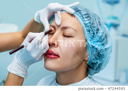 tattoo eyebrow and lips 47244593