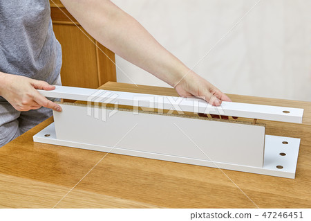 Assemble of furniture with dowels for wood joinery Assemble of furniture with dowels for wood joinery 47246451