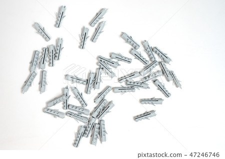 Plastic dowel pin or wall plugs on white background 47246746