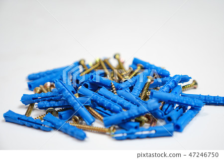 Plastic dowel pin or wall plugs on white background 47246750