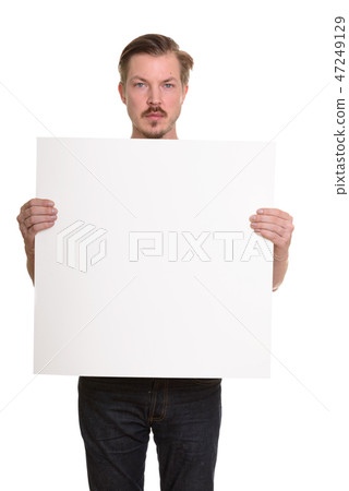 Portrait Of Man Isolated Against White Background Portrait Of Man Isolated Against White Background 47249129