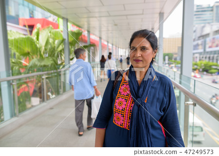 Mature beautiful Indian woman exploring the city of Bangkok, Tha Mature beautiful Indian woman exploring the city of Bangkok, Tha 47249573