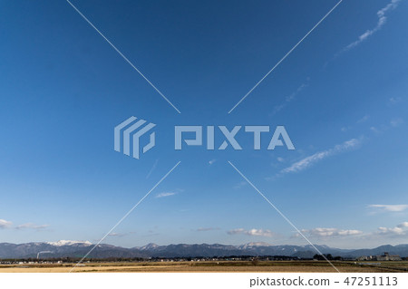 Suzuka mountain range distant from the plains of Lake East in winter Suzuka mountain range distant from the plains of Lake East in winter 47251113