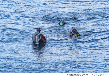 A large scuba diver A large scuba diver 47253456