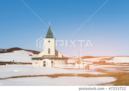 Small church over snow around 47253722