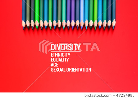 Diversity concept. row of mix color pencil on red Diversity concept. row of mix color pencil on red 47254993