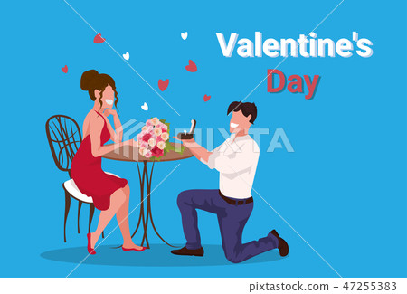 man kneeling holding engagement ring proposing to woman marry him happy valentines day concept man kneeling holding engagement ring proposing to woman marry him happy valentines day concept 47255383