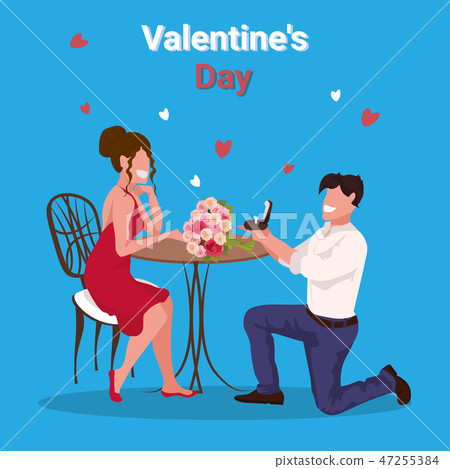 man kneeling holding engagement ring proposing to woman marry him happy valentines day concept man kneeling holding engagement ring proposing to woman marry him happy valentines day concept 47255384