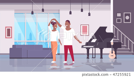 couple dancing man woman happy lovers home hall musical instruments piano guitar modern apartment 47255921