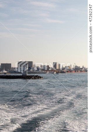 The wake of a high-speed ferry leaving Ishigaki Port Okinawa Tourism The wake of a high-speed ferry leaving Ishigaki Port Okinawa Tourism 47262147