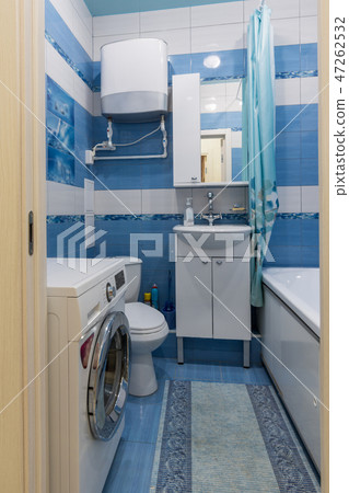 Entrance to a small bathroom with toilet 47262532