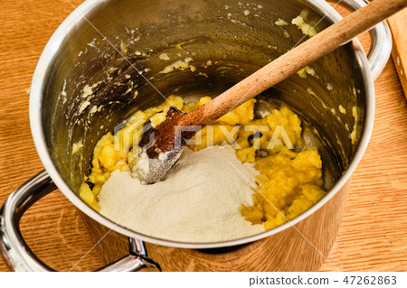 Preparing potato dough for flat cakes 47262863