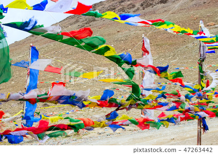 Tibetan colorful flags develop in the wind. 47263442