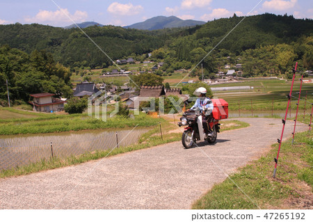 Countryside and Postman 47265192