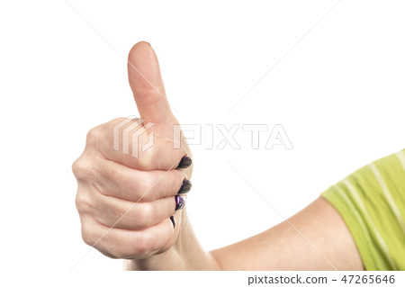 Female hand showing thumbs up Female hand showing thumbs up 47265646
