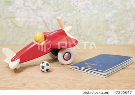 Soccer ball near airplane and passport Soccer ball near airplane and passport 47265647