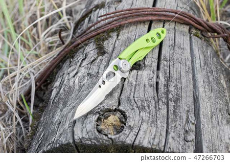 Knife with a serration blade. Front view. Knife with a serration blade. Front view. 47266703